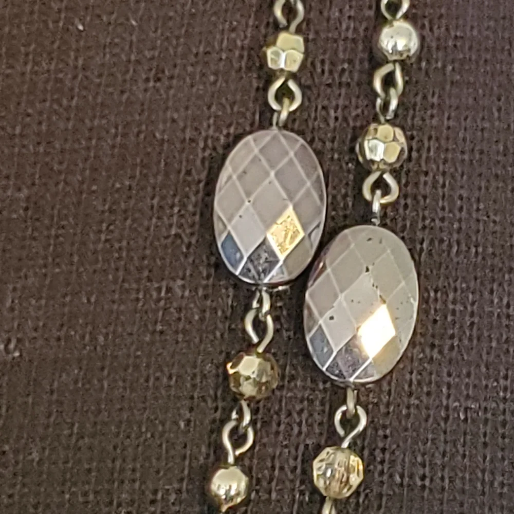 Silvertone and black bead and geometric stations necklace